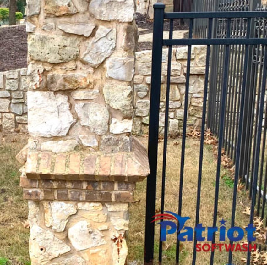 Limestone Fence After - Patriot SoftWash